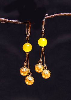 Modern Yellow Pearl Tassels Drop Earrings925 Silver.Made of fine Pearl.Measurement: 6cm/2.34" * 1.5cm/0.585". Matches easily with daily hairstyle, dresses & Shirts Elegant Yellow Long Drop Jewelry, Elegant Adjustable Tassel Drop Earrings, Elegant Yellow Dangle Tassel Earrings, Elegant Yellow Tassel Earrings For Gift, Yellow Pearl, Daily Hairstyles, Tassel Drop Earrings, Tassels, Yellow