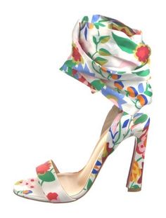 Christian Louboutin Satin SandalsWhiteFloral PrintPlatformWrap-Around Straps & Tie ClosuresDesigner Fit: This style typically runs a half size to a full size small. White High Heel Sandals With Floral Print, White Ankle Strap Heels With Floral Print, White Floral Print High Heel Sandals, Fitted Heels For Spring Vacation, White Sandals With Floral Print For Spring, Summer Ankle Wrap Heels, White Floral Print Sandals For Spring, Fitted Ankle Wrap Heels For Summer, White Floral Print Heels For Summer