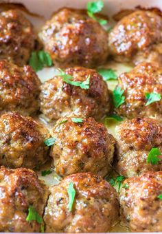 meatballs with parsley in a casserole dish ready to be eaten and served