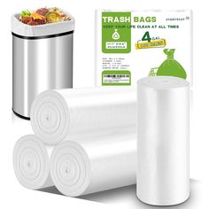 three rolls of trash bags next to a trash can