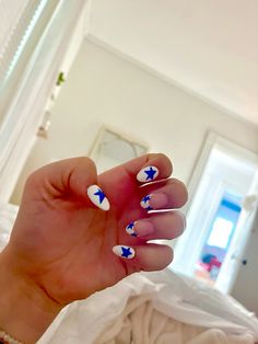 fun nails | summer nails | cool nail designs | blue and white nails | star nails | funky acrylic nails | summer style | nail inspo White And Blue Star Nails, White Nails With Blue Stars, How To Do Stars On Nails, Blue And White Star Nails, Summer Nails Stars, White Nails With Stars, Star Almond Nails, Cape Cod Nails