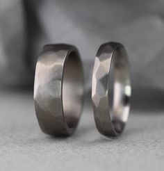 two wedding bands made to look like they are in the same ring size as each other