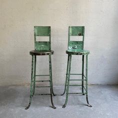 Tall, industrial, early 20th century, light green, painted steel, shop stools feature their wonderful, work-worn original patina. Summer Lighting, Steel Stool, Industrial Stool, Shop Stool, Backless Stools, Industrial Bar Stools, Stools With Backs, Antique Interior, Low Stool