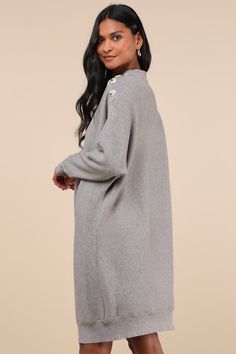 Head out for the day feeling as comfy as you are cute in the Lulus Cozy Stroll Grey Mock Neck Button Mini Sweater Dress! Soft, lightweight ribbed knit shapes this casually chic dress with a mock neckline framed by long, dolman sleeves with decorative tortoise buttons at the shoulders. The relaxed, pullover silhouette falls to a cute mini hem, perfect for showing off your favorite knee-high boots! Fit: This garment fits true to size. Length: Knee Length. Size medium measures 32" from shoulder to hem. Bust: Great for any cup size. Waist: Not Fitted - comfortable room throughout midsection. Hip: Not Fitted - room for hips. Undergarments: May be worn with any standard bra. Fabric: Fabric is very stretchy. Unlined. 50% Rayon, 26% Polyester, 24% Nylon. Hand Wash Cold. Do Not Bleach. Line Dry. Ir Boots Fit, Casually Chic, Mini Sweater, You Are Cute, Mini Sweater Dress, Mock Neckline, Chic Dress, Dolman Sleeve, High Boots