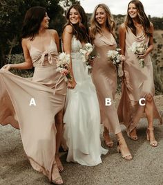 the bridesmaids are all wearing different dresses