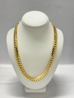 Indulge in the timeless elegance of our Cuban link chains and bracelets, meticulously handcrafted to perfection. Each piece is a solid statement of craftsmanship, created with passion and precision. Our Cuban link collection is plated not once, not twice, but five times with a lavish 14K Gold polish, ensuring a radiant and opulent finish that exudes sophistication. Embrace the uniqueness of handmade jewelry, where each link is carefully assembled to create a one-of-a-kind masterpiece. Our commit Classic Wedding Chain Necklace, Classic Cuban Link Jewelry With Polished Finish, Classic Link Jewelry For Anniversary, Luxury Gold Chain Necklace For Wedding, Formal Chain Link Jewelry With Polished Finish, Formal Cuban Link Jewelry With Polished Finish, Elegant Cuban Link Necklace With Polished Finish, Formal Cuban Link Necklace With Curb Chain, Formal Polished Chain Link Jewelry