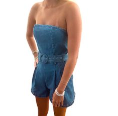 Introducing the Josie Denim Romper Embrace effortless style with the Josie Denim Romper, the ultimate choice for your summer adventures. This chic strapless design features a flattering belted waist that accentuates your silhouette, making it a must-have piece for any fashion-forward wardrobe. Key Features: Strapless Style: Stay cool and stylish during warm summer days. Belted Design: Highlights your waist for a tailored look. Durable Denim Fabric: Made to withstand all your summer escapades whi Belted Romper, Denim Belt, Belt Design, Summer Concert, Denim Romper, Summer Adventures, Denim Jumpsuit, Denim Fabric, Effortless Style