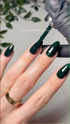 For dark green nails, this rich, moody shade brings an elegant yet edgy vibe to any manicure. Whether it's glossy, matte, or paired with gold accents, dark green nails are the ultimate trendsetter for 2024, giving off major luxe and nature-inspired feels. #DarkGreenNails #NailInspo #EmeraldVibes #MoodyManicure #GreenNailTrend Fall Nails Minimalist Design, Single Color Manicure, Almond Nails Ideas Solid Colors, Dark Almond Nails Fall, Oval Nails Fall Colors, Winter Color Nails Gel, Plain Coloured Nails, Almond Nails Dark Colors, Dark Oval Nails