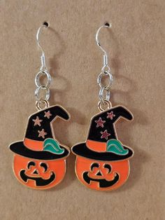 Handmade earrings for a spooky holiday mood! So cute for yourself or your little wizard or witch! Witchy Halloween Earrings, Handmade Witchy Earrings For Halloween, Fun Orange Jewelry For Halloween, Cute Halloween Party Jewelry, Fun Orange Halloween Jewelry, Hypoallergenic Jewelry For Halloween Party, Fun Halloween Dangle Earrings, Spooky Halloween Jewelry For Costume Party, Novelty Jewelry For Halloween Costume