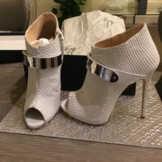 Giuseppe Zanotti White Peep Toe White Leather Bootie, Size 39, 5 Inch Heel Super Sexy Brand New Never Worn With Original Box. Sexy Bootie! White Sculpted Heel Cocktail Heels, Glamorous White Leather Heels, White Heel Strap Heels For Cocktail, White Ankle Strap Heels For Cocktail, White Heels With Heel Strap For Cocktail, White Heels With Heel Strap For Cocktail Occasions, White Leather Heels For Cocktail, Designer White Heels For Party, Designer White Heels For Cocktail Occasions