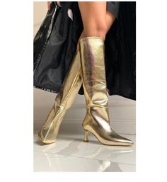 Ladies who love shine, This boot is for you. A magnificent show of gold color. Heel Height: 5 cm. Gold Knee-high Boots For Fall, Gold High Ankle Boots For Party, Gold High Ankle Party Boots, Gold Heeled Boots With Round Toe For Winter, Gold Pointed Toe Knee-high Boots For Party, Glamorous Gold Heeled Boots For Party, Gold Knee-high Winter Boots, Gold Fitted Knee-high Boots, Fitted Knee-high Gold Boots