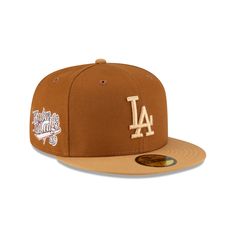 The Union X Los Angeles Dodgers Brown 59FIFTY Fitted Hat features an embroidered Dodgers logo at the front panels with a Union logo at the rear. Additional details include a 1989 Know The Ledge patch at the right-wear side and a green undervisor. Brown Curved Brim Fitted Hat For Streetwear, Retro Brown Baseball Cap For Streetwear, Throwback Hats With Embroidered Logo And Curved Brim, Brown Trucker Hat With Logo Patch For Streetwear, Brown Snapback Fitted Hat For Sports Events, Throwback Curved Brim Hat With Embroidered Logo, Streetwear Cap With Embroidered Patch, Brown Flat Brim Sports Hat, Throwback Baseball Season Hat With Embroidered Logo