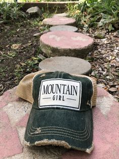 Vintage Distressed Trucker Cap "Mountain Girl"Color: Black Distressed Material: Cotton/Polyester blend, Mesh backSize: One size fits most, with an adjustable snapback strap. Unisex cap. Cheap Distressed Cotton Trucker Hat, Distressed Trucker Hat For Outdoor, Cheap Distressed Trucker Baseball Cap, Distressed Trucker Baseball Cap, Girl Trucker, Adventure Trucker Baseball Cap 5-panel, Mountain Girl, Womens Baseball Cap, Caps For Women