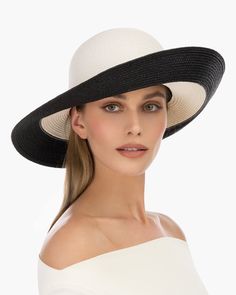 A versatile women's skimmer of our patented Squishee® packable straw with a contrast border which frames the face. Eric's desire to create a simple, striking sun hat that would take you from morning to sun down, resulted in this design. Whether you are strolling the beach or attending a pool-side brunch, you will look your best and have the security of protecting your skin. The Francoise rollable hat for sale online looks good on almost everyone and offers advanced sun protection, durability and