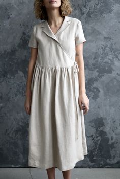 Beige Linen V-neck Dress, Beige Summer Wrap Dress, Beige Wrap Dress With Tie Waist, Casual Linen V-neck Wrap Dress, Beige Short Sleeve Wrap Dress, Beige Short Sleeve Dress With Tie Waist, Linen Dress With Tie Waist And Short Sleeves, Short Sleeve Linen Dress With Tie Waist, Summer Linen Dress With Surplice Neckline