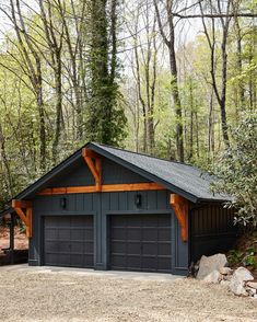 a garage in the middle of a wooded area