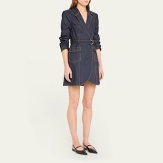 Cinq à Sept "Jenessa" indigo denim dress detailed with contrast topstitching and a D-ring belt Notched lapels; button closure Signature stylized sleeves Three-button cuffs Front flap patch pockets Mini length Cutaway hem A-line silhouette Cotton/polyester/elastane Dry clean Imported Chic Belted Denim Dress For Work, Chic Indigo Denim Dress For Work, Indigo Denim Dress For Workwear In Fall, Dark Wash Denim Dress For Work With Button Closure, Dark Wash Denim Dress With Button Closure For Work, Dark Wash Denim Dress For Work, Indigo Denim Dress For Work, Knee-length Belted Denim Dress For Work, Belted Long Sleeve Denim Dress For Work