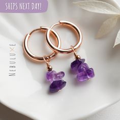 💜 Adorn yourself with the timeless elegance of our Amethyst Hoop Earrings, designed to celebrate the February birthstone in a natural and handmade crystal jewelry piece. These earrings are a perfect choice for those who appreciate the charm of this exquisite gem and add a touch of sophistication to your collection of crystal jewelry 💜 ⭒ Material: Stainless Steel  ⭒ Finish: Silver * Gold * Rose Gold ⭒ Hoop Size:  thickness: 2.5mm / internal diameter: 10mm or 14mm ⭒ Gemstone size: x3 chips 5-8mm Hoop Earrings With Natural Stones For Gift, Amethyst Hoop Earrings Gift, Amethyst Dangle Hoop Earrings Gift, Gift Amethyst Hoop Earrings With Ear Wire, Amethyst Gemstone Hoop Earrings As Gift, Amethyst Hoop Earrings With Gemstone For Gifts, Amethyst Hoop Earrings With Ear Wire, Gift, Raw Crystal Earrings, Handmade Crystal Jewelry