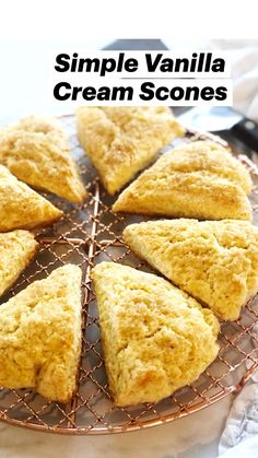 several scones on a wire cooling rack with the words vanilla and cream scones