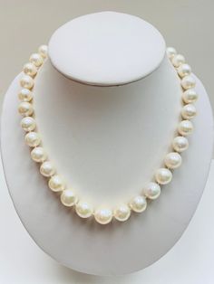 "This natural pearl is perfect for any elegant look! It is made with natural freshwater pearls that will look stunning on all of your outfits. The natural pearls mixed front larger pearl and back smaller pearl with the beautiful clasp style will give you an effortless yet elegant look! Wear it to formal events such as parties and weddings. It is also a good gift for family members and friends. Pearl Size: 10 mm  Necklace Length: 19\" If you are looking for something longer, then check out this stunning piece: https://www.etsy.com/listing/910357993/" Pearl Necklace Classic, Pearl Necklace Bridal, Pearl Necklace Freshwater, Classic Pearl Necklace, Natural Pearl Necklace, Necklace Bridal, Freshwater Pearl Necklace, Handmade Jewelry Diy, Natural Pearl