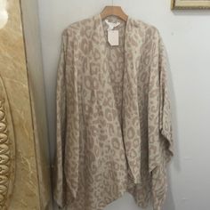 Rose Color Poncho One Size Spring Cape Outerwear, Oversized Cape Cardigan For Spring, Chic Shawl Outerwear For Spring, Chic Spring Outerwear Shawl, One Size Batwing Sleeve Cape For Spring, Oversized Long Sleeve Beige Cape, Beige Cozy Long Sleeve Cape, Casual Beige Long Sleeve Cape, Oversized Cream Cape For Fall