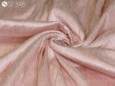 Blush Pink Pure Dupioni Fabric Raw Silk by the Yard Indian Wedding Dresses Pillow Cover Drapery Blouses Curtains Cushions Costume sewing ➤Color:  Bridal Blush Pink. ➤Quality: The fabric is 100% dupioni silk of the highest grade. (100gsm) ➤Width: 44 inches ➤Code: sf346 ➤Listing for 1 Yard of fabric Bridal Blush Pink silk or raw silk fabric, made from pure silk yarn. This is a very beautiful tone-on-tone Blush Pink. Indian dupioni silk or raw silk fabric, made from pure silk yarn. 100% pure silk fabric has been made in India. This dupioni is perfect for bridal & bridesmaids dresses, drapery, quilting, pillows, & chair upholstery, Dresses, Tops, Blouses, Jackets, Crafting, Clutches or Evening Bags, Embellish your clothes, Home Décor, Outdoor, Quilting, Sewing, General etc use it for scrap boo Quilting Pillows, Dupioni Silk Fabric, Wedding Dress Costume, Drapery Curtains, Indian Wedding Dresses, Costume Sewing, Raw Silk Fabric, Silk Cushions Covers, Pink Curtains