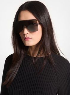 Our London sunglasses epitomize eye-catching style. Featuring oversized frames for an ultra-modern look, these shield-like shades are finished with a subtle “MK” detail on the arms. The lightweight frame feels effortless, but is strong enough to withstand all day wear. Modern Sunglasses With Gradient Lenses For Fall, Sleek Polarized Shield Sunglasses For Summer, Sleek Shield Sunglasses For Summer, Modern Tinted Sunglasses For Fall, Modern Tinted Lenses Sunglasses For Fall, Elegant Polarized Shield Sunglasses For Spring, Elegant Shield Sunglasses With Polarized Lenses For Spring, Chic Michael Kors Sunglasses With Uv Protection, Chic Michael Kors Polarized Sunglasses