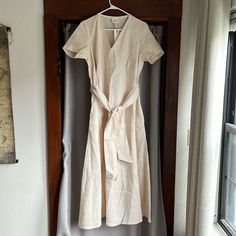 Hand Made Ivory Linen Dress From 'Linen Handmade Studio' In Lithuania. Brand New With Tags And In Perfect Condition. Size Xl (16). This Is A Great Staple For Summer! Cream Linen Fitted Midi Dress, Fitted Cream Linen Midi Dress, Neutral Fitted V-neck Midi Dress, Neutral V-neck Fitted Midi Dress, Beige Cotton V-neck Midi Dress, Fitted Neutral Midi Dress With Short Sleeves, Fitted Short Sleeve Neutral Midi Dress, Neutral Fitted Short Sleeve Midi Dress, Beige Relaxed Fit V-neck Midi Dress