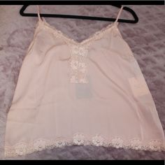 This Is A Brand New Lace Slip Blouse That Is A Pale Blush Pink. This Is Brand New And Has The Tags Still Connected. Price Is Negotiable! Pink Camisole With Spaghetti Straps For Brunch, Chic Pink Blouse With Lace Trim, Pink Camisole Blouse For Summer, Chic Pink Camisole With Lace Trim, Pink Camisole For Spring Brunch, Pink Camisole For Brunch In Spring, Spring Pink Camisole For Day Out, Pink Spring Camisole For Day Out, Chic Pink Lace Trim Camisole