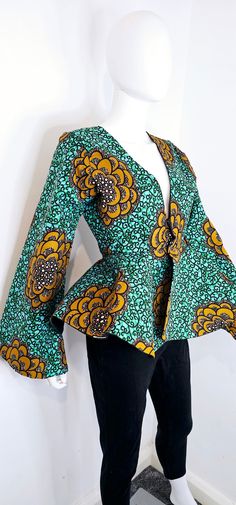 A must have women top. With lingerie trumpet Sleeve and beautiful flare. Size 8, suitable for any occasion or event. Nice Ankara Tops, Ankara Flare Tops, Basque Top Ankara, Victorian Corset Top Ankara, Ankara Peplum Top With Front Zip, Top Designs For Women, African Print Peplum Top