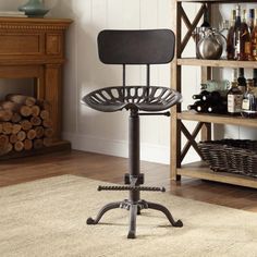 a bar stool with an adjustable backrest and foot rest in front of a fireplace