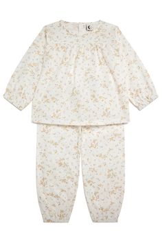 A children's set in a Bunny print, featuring a vintage inspired button back blouse and balloon trouser. 100% organic cotton poplin, a lightweight woven fabric keeping your little ones comfortable this season. Sizing & care This set is true to size, no need to size up. Wash at 30 degrees, but please do not tumble dry. Beautifully made in a small factory in Portugal. Please note these are small collections each season and sizes do sell out.Details• Made in United Kingdom • Care Instructions: Machine wash • Weight: 10.58 oz (300 g) Cotton Playtime Sets With Floral Print, Cotton Floral Print Playtime Sets, Childrens Pyjamas, Pyjamas Set, Bunny Print, A Bunny, Kids Store, Sell Out, Kids Sleepwear