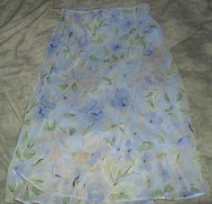 Used, light blue skirt. Size M and stretches at the waist band. Clean, comes from a smoke/pet free home. Cheap Y2k Blue Skirt, Casual Light Blue Floral Print Skirt, Spring Blue Patchwork Skirt, Floral Skirt Light Blue, Fairy Kei Ruffled Mini Skirt For Summer, Light Blue Skirts, Fairy Kei Fashion, Blue Floral Skirt, Kei Fashion