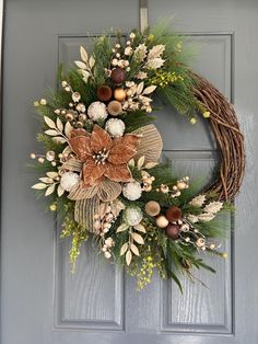 a christmas wreath hanging on the front door