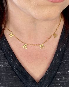 Get this gorgeous and popular Mama Necklace for your mom or wear it as the proud mom that you are! 18k gold plated stainless steel with a dainty 16" gold chain, chain extension opens to 18" total Spring lock clasp 0.25" Letters Letters lay flat on the neck Everyday Gold Charm Necklace With Custom Name, Everyday Adjustable Gold Name Necklace, Trendy Personalized Gold Name Necklace, Trendy Gold Custom Name Necklace, Trendy Custom Name Gold Necklace, Trendy Gold Name Necklace For Personalized Gift, Gold Initial Necklace With Adjustable Chain For Mother's Day, Trendy Gold Initial Necklace For Personalized Gift, Gold Charm Necklace Custom Name For Mom