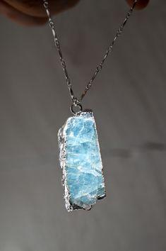 We all need a crystal pendant necklace like this stunning Aquamarine necklace! Not only can it be worn day to day but it can also be a statement piece for going out, layered with other Fierce Forward jewels. Aquamarine carries properties of flow, fluidity, and trust. Wear your I Trust My Path Necklace and remember to trust yourself and the path you're on! This necklace goes well with a pair of statement earrings, like the I Am Crystal Clear Arrowhead Earrings model wears in images. Aquamarine ge Arrowhead Earrings, Earrings Model, Aquamarine Necklace, Handmade Jewelry Tutorials, Crystal Pendant Necklace, I Trust, Mala Necklace, Aquamarine Gemstone, Silver Bars