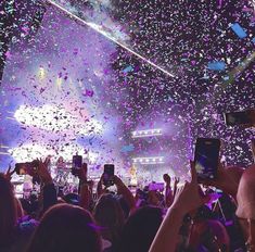 confetti is thrown in the air at a concert