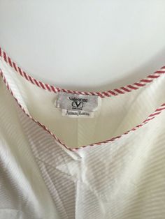 Vintage Valentino Intimo White Chemise nightgown or slip. Neiman Marcus tag No size tag. No fabric content tag.  Presumed to be cotton but may be a blend! Some yellowing.   See photos.  18.5 inch bust, 31.5 inch length.   Straps do not adjust! Please ask questions!  No returns! Sold as is. With flaws. No returns. White Cotton V-neck Sleepwear, Cotton V-neck Nightgown For Sleepover, Spring Cotton V-neck Nightgown, Cotton V-neck Nightgown For Bedtime, Red Cotton Nightgown For Sleepover, White Cotton Dress For Pajama Party, Red Cotton Nightgown For Pajama Party, Cotton V-neck Top For Bedtime, Red Cotton Nightgown For Loungewear