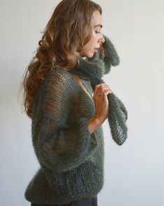 Hello, I'm the one, who won't let you down - khaki green mohair sweater. I will comfort you, keep you warm and will make you smile. I'm 100% hand made and proud of that. I consist of 70% italian kid mohair and 30% of nylon, which makes me incredibly natural. I'm quite unique as could be worn all year long. I'm in one size and one size fits all because my measurements are : ❤️ Width -(under a bra -58 cm, on the bottom -52 cm) ❤️ Lengths -54 cm I'm a unique one, you could were me with open back or Green Mohair Cozy Sweater, Cozy Green Mohair Sweater, Green Mohair Knitted Sweater, Green Mohair Winter Sweater, One Size Mohair Sweater For Winter, Oversized Open Knit Green Sweater, Oversized Green Open Knit Sweater, Sweater With Scarf, Stylish Sweater