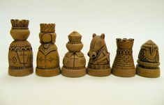 a group of clay figurines sitting next to each other