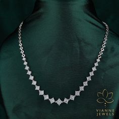 Dive into the realm of unparalleled brilliance and elegance with our stunning 16.16 Total Carat Weight Princess Cut Lab-Grown Diamond Necklace. Crafted with precision and love, each princess-cut diamond showcases a distinct square silhouette known for its sharp angles and beautiful symmetry, embodying both modernity and timeless allure. Not only is the princess cut known for its contemporary charm, but it also exudes a luminous sparkle that's hard to resist. With a total carat weight of 16.16, this necklace guarantees a lavish display of shimmer and sheen with every turn of your neck. Sustainably crafted, these lab-grown diamonds offer the same physical, chemical, and optical properties as mined diamonds. Being ethically sourced and environmentally friendly, they present a conscious choice Lab Grown Diamond Necklace, Luxury Bridal Necklace With Vvs Clarity For Formal Occasions, Luxury Bridal Necklace With Vvs Clarity For Anniversary, Luxury Bridal Necklace For Formal Occasions, Luxury Vvs Clarity Diamond Necklace For Wedding, Luxury Bridal Necklace With Diamond Accents, Luxury White Gold Bridal Necklace, Luxury Diamond White Bridal Necklace, Luxury Bridal Necklace With Diamond Cut For Anniversary