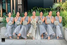 a group of women standing next to each other