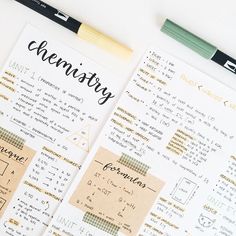 two sheets of paper with writing on them next to a pen and marker that says chemistry