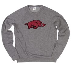 PRICES MAY VARY. Blue 84 fan favorite Arkansas Razorbacks men's tri-blend crewneck sweatshirt This Arkansas men's crew sweatshirt has a distressed icon graphic perfect for any Hogs fan that loves to show their team pride Each Arkansas Razorbacks sweatshirt is made from a cozy tri-blend fleece with raglan sleeves This soft sweatshirt is great for layering or wearing on it's own, making it a perfect addition to any Arkansas fans wardrobe All Blue 84 products are officially licensed by the universi Vintage Icons, Arkansas Razorbacks, Sweatshirt Vintage, Crew Sweatshirts, Vintage Sweatshirt, Arkansas, Raglan Sleeve, Crewneck Sweatshirt, Crew Neck Sweatshirt