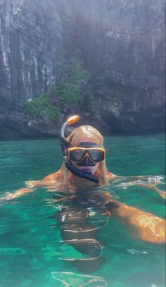 A blonde girl snorkelling in blue water Snorkeling Pictures Aesthetic, Thailand Vacation Aesthetic, Thailand Vision Board, South East Asia Travel Aesthetic, Backpacking Aesthetic Asia, South East Asia Travel Outfits, South East Asia Aesthetic