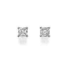 Enjoy a nice large look with this pair of asscher diamond stud earrings. The two center diamonds total 2.00 ct and are certified at F color and VS2 (eye clean) clarity enhanced. Colorless and eye clean. a great value combination! These round diamond studs will sparkle for a lifetime! The diamonds are set on 14k white gold setting. These asscher cut studs will sparkle for a lifetime! Luxury White Asscher Cut Diamond Earrings, Diamond White Asscher Cut Earrings With Brilliant Facets, White Diamond Earrings With Diamond Accents In Asscher Cut, White Diamond Earrings With Asscher Cut And Accents, White Diamond Asscher-cut Earrings, Classic Octagon Diamond Earrings, Asscher Cut Diamond Earrings With Accents In White Gold, Asscher Cut Diamond White Diamond Earrings, Timeless Asscher Cut Earrings For Anniversary