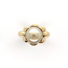 All of our jewelry is guaranteed authentic by our Graduate Gemologist of the Gemological Institute of America (GIA). 18k Yellow Gold 9.8mm Light Golden South Seas Pearl Ring Size 8.25 (#J6338) 18k yellow gold ring featuring a large 9.8mm creamy light golden cultured South Seas pearl. Heavy mounting that is solid underneath. The ring fits a size 8.25 finger, it weighs a heavy 7.40 dwt., and is contemporary. Absolutely beautiful! SKU#J6338. 100% Satisfaction Guaranteed! Yellow Gold Pearl Ring With High Luster, Luxury High Luster Gold Pearl Ring, 14k Yellow Gold Polished Pearl Ring, Luxury Antique Gold Pearl Ring, Luxury Yellow Gold Pearl Ring With Polished Finish, Golden South Sea Pearls, Big Bend, South Seas, South Sea Pearls