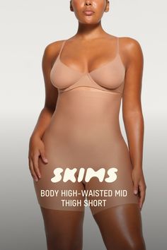 This sleek high waist short tones your thighs and enhances your butt for your best curves ever. Hits at the mid-thigh. Features an open gusset, interior bonded elastic along the waist, and raw cut leg openings for a smooth look. Fits true to size. Size down for more compression. | SKIMS High-Waisted Mid Thigh Short | Black | XS | SKIMS Body Micro-elastic Smoothing Shapewear With High-cut Leg, Seamless Stretch Shapewear, Mid-thigh Length, Solid Color Micro-elastic Mid-thigh Shapewear, Solid Micro-elastic Mid-thigh Shapewear, Compressive Beige Shapewear Mid-thigh Length, High Waist Short, Mid Thigh Shorts, Black Xs, Black Media