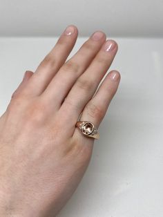 This stunning rose gold morganite and diamond ring is a modern update on the classic signet pinky ring. Featuring a beautiful peach hued oval morganite and 6 sparkling white diamonds all bezel set in a high polished rose gold setting, this ring adds some elevated glamor and a modern refresh to the classic pinky ring. All our gemstones are carefully selected for their color and quality of gemstone. Designed and Handcrafted in NYC by our team of master jewelers. US size 6- Free Sizing available. C Rose Gold 14k Gemstone Signet Ring, Rose Gold Signet Ring With Gemstone, Rose Gold Gemstone Signet Ring, Classic Oval Morganite Diamond Ring, Round Rose Gold Signet Ring With Gemstone, Rose Gold Oval Signet Ring With Gemstone, Oval Rose Gold Signet Ring Fine Jewelry, Oval Rose Gold Signet Ring With Gemstone, Rose Gold Oval Signet Ring In Fine Jewelry Style