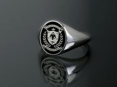 Coat of Arms jewelry - Family Crest Ring for Men ~ Customization included in purchase with your name or text on upper and lower ribbon, as preferred. Leave your note on chekcout. ✪ Classic Elegant design for men appearance with black enamel filling at face. ☛ Ring size as preferred, as it is custom created for you in our workshop. (select your ideal one in drop down menu) ☛ Custom design inside ring with your own personalized logo / pattern / symbol is possible. Contact us now! ❏ Material: ✪ Rin Classic Oval Hallmarked Enamel Ring, Oval Enamel Ring With Polished Finish As Gift, Oval Signet Ring With Polished Finish For Commemoration, Classic Oval Enamel Ring For Gift, Classic Silver Enamel Ring For Formal Occasions, Oval Engraved Enamel Ring For Formal Occasions, Silver Oval Enamel Ring, Silver Oval Signet Ring For Commemoration, Family Crest Ring